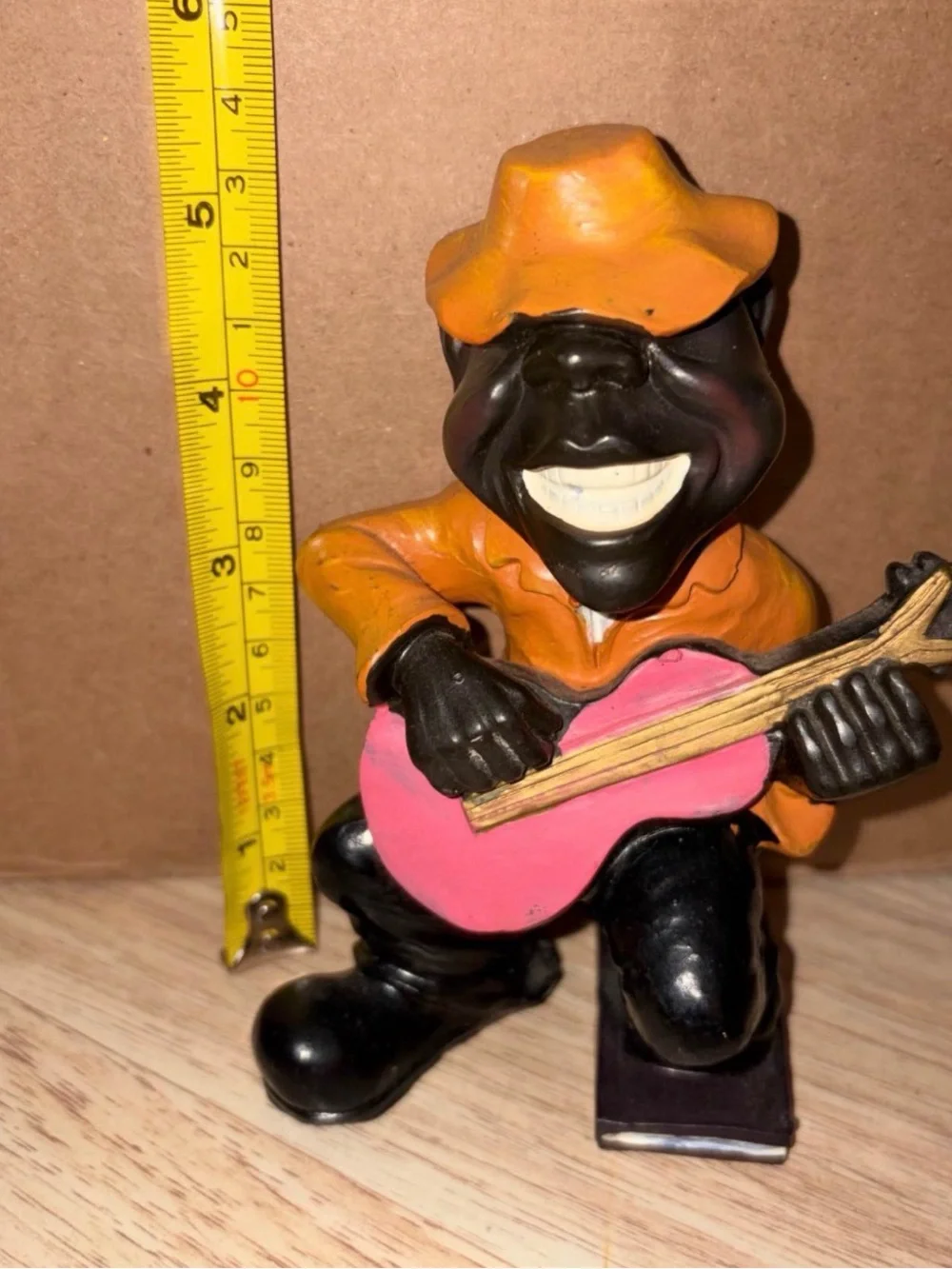 Orange and Pink Guitarist Collectible figure